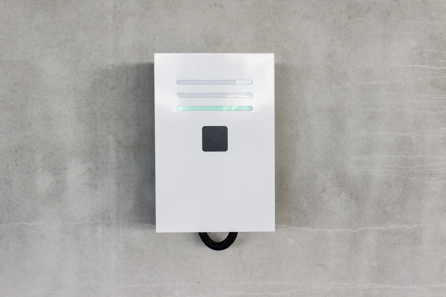 Wall-mounted home battery storage unit installed indoors